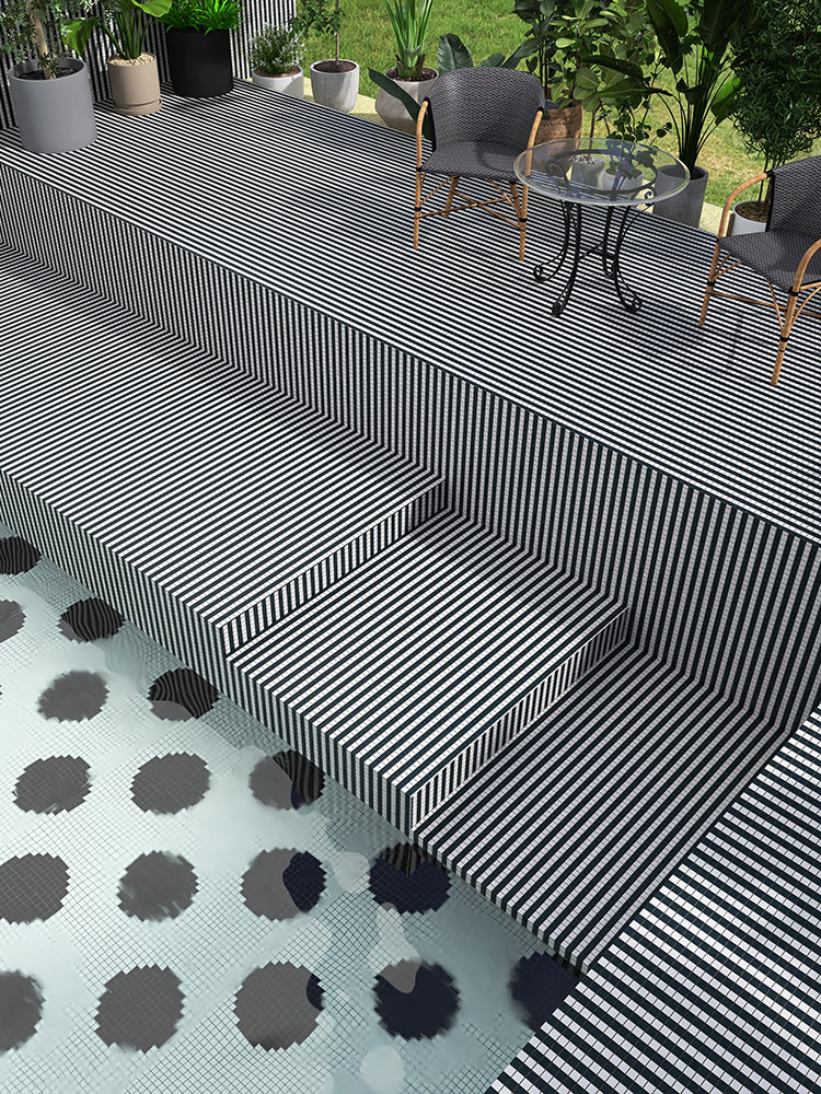 Black and white mosaic tiles in the pool with striped and bubble patterns.