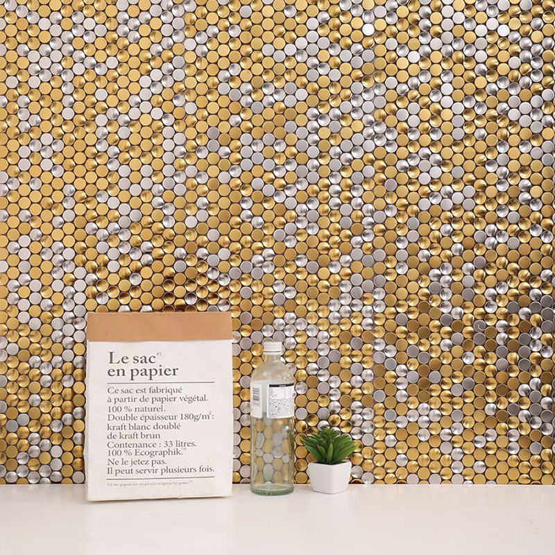 Penny wall tiles in gold and silver for stylish modern wall decor