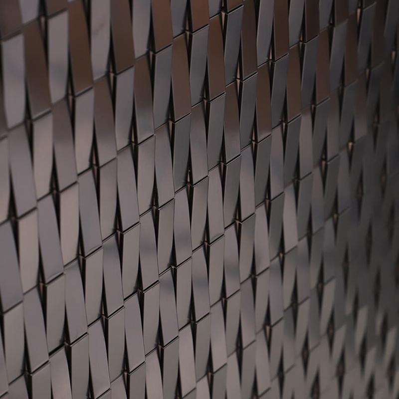 Groutless tile backsplash with dark metallic 3D geometric texture pattern