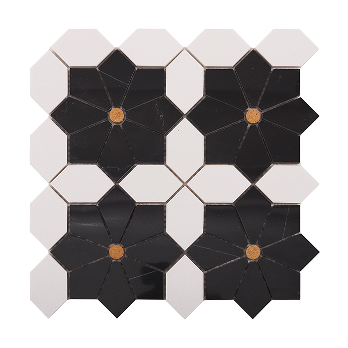 A sheet of black and white marble floral mosaic tiles.