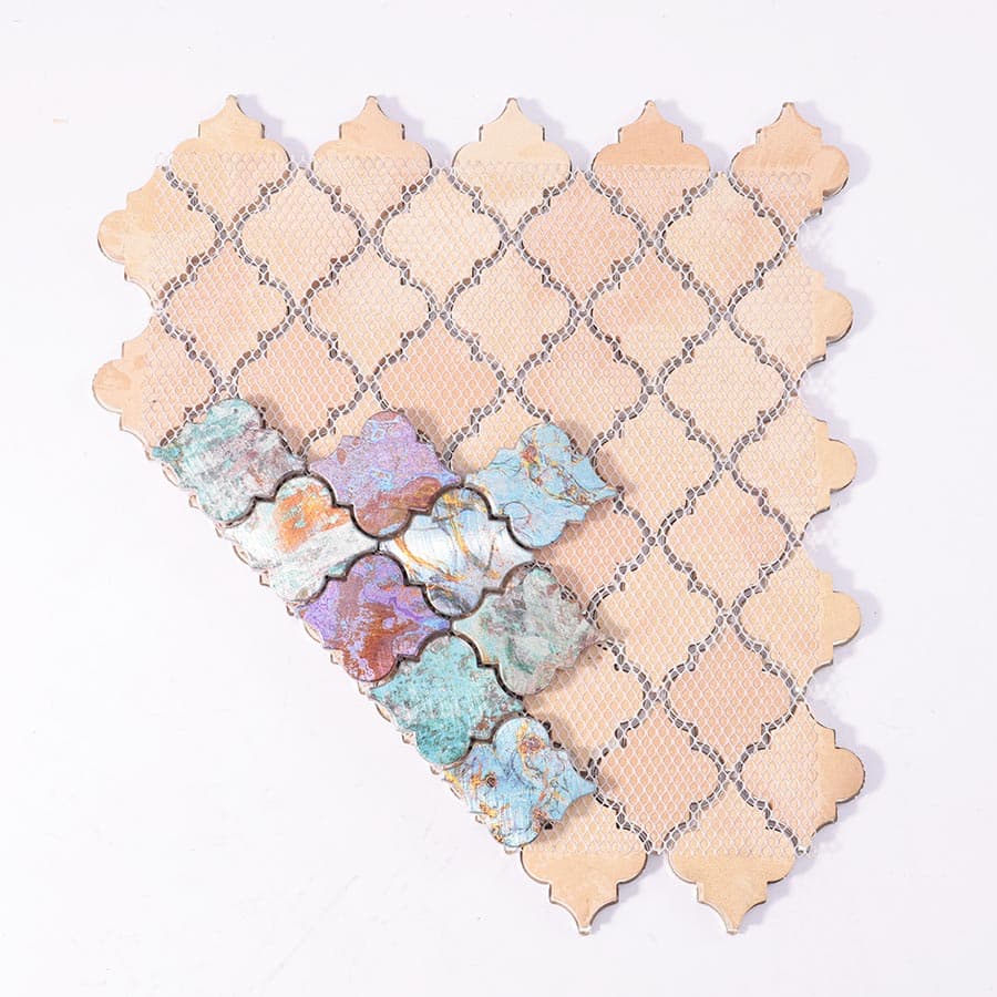 Back view of Moroccan aluminum tile with mesh backing and partial tile overlay in oxidized finish.