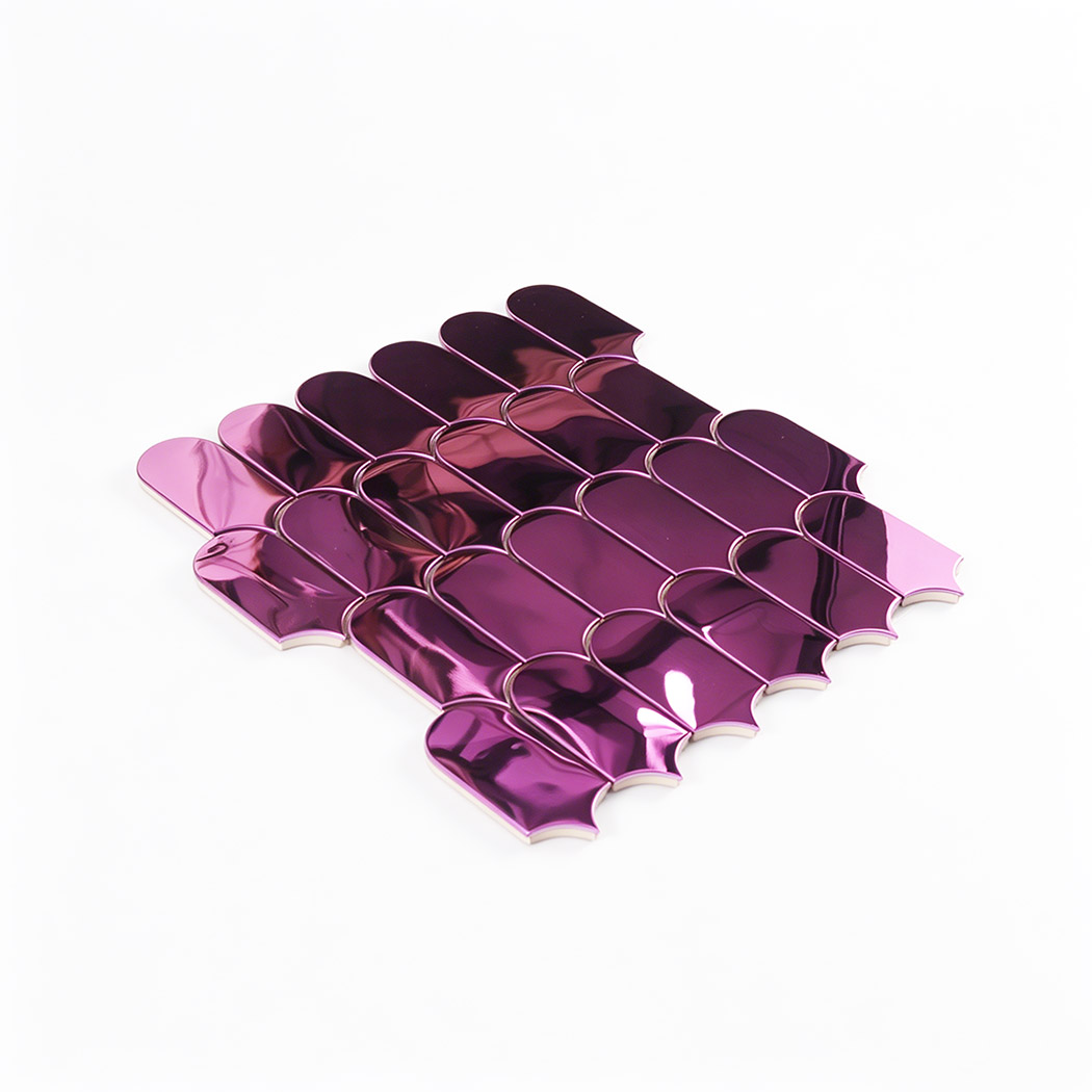 Angled view of pink mirror arch metal mosaic tile sheet with glossy finish