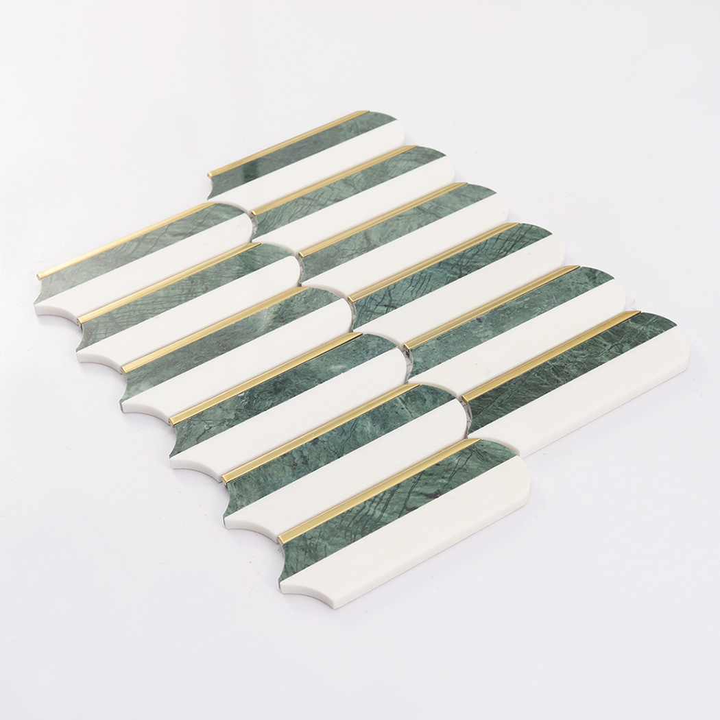 Angled view of a green and white scalloped marble mosaic tile sheet on a white background.
