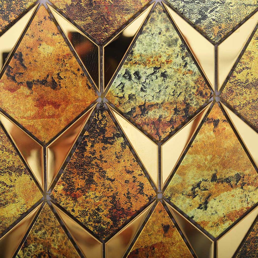 Detailed texture of antique diamond mosaic tiles with reflective gold metal accents
