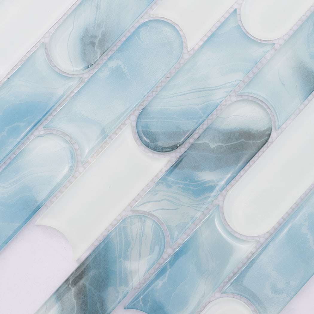 Aqua blue and white capsule glass mosaic tile surface with flowing patterns
