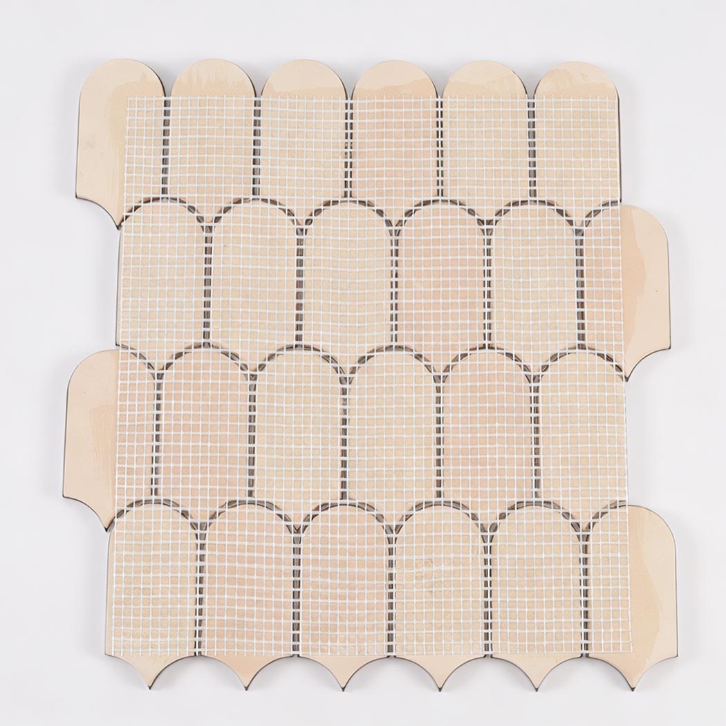 Back view of gold arch metal mosaic tile sheet with mesh mounted backing