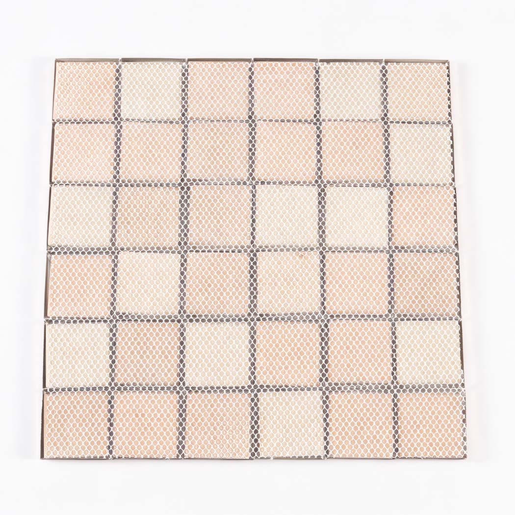 Back view of rose gold square mosaic tile sheet with mesh mounted backing
