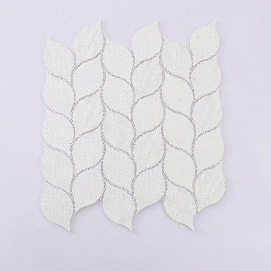 Mesh backing of white leaf shaped mosaic tile sheet