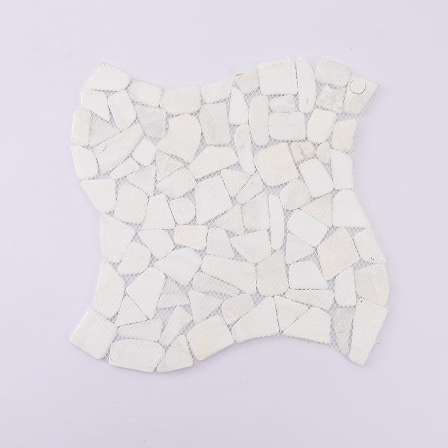 Mesh backing of white pebble mosaic tile sheet