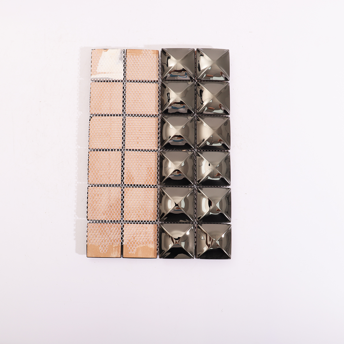 Backside of the glossy black 3D mosaic tiles, showing structural support.