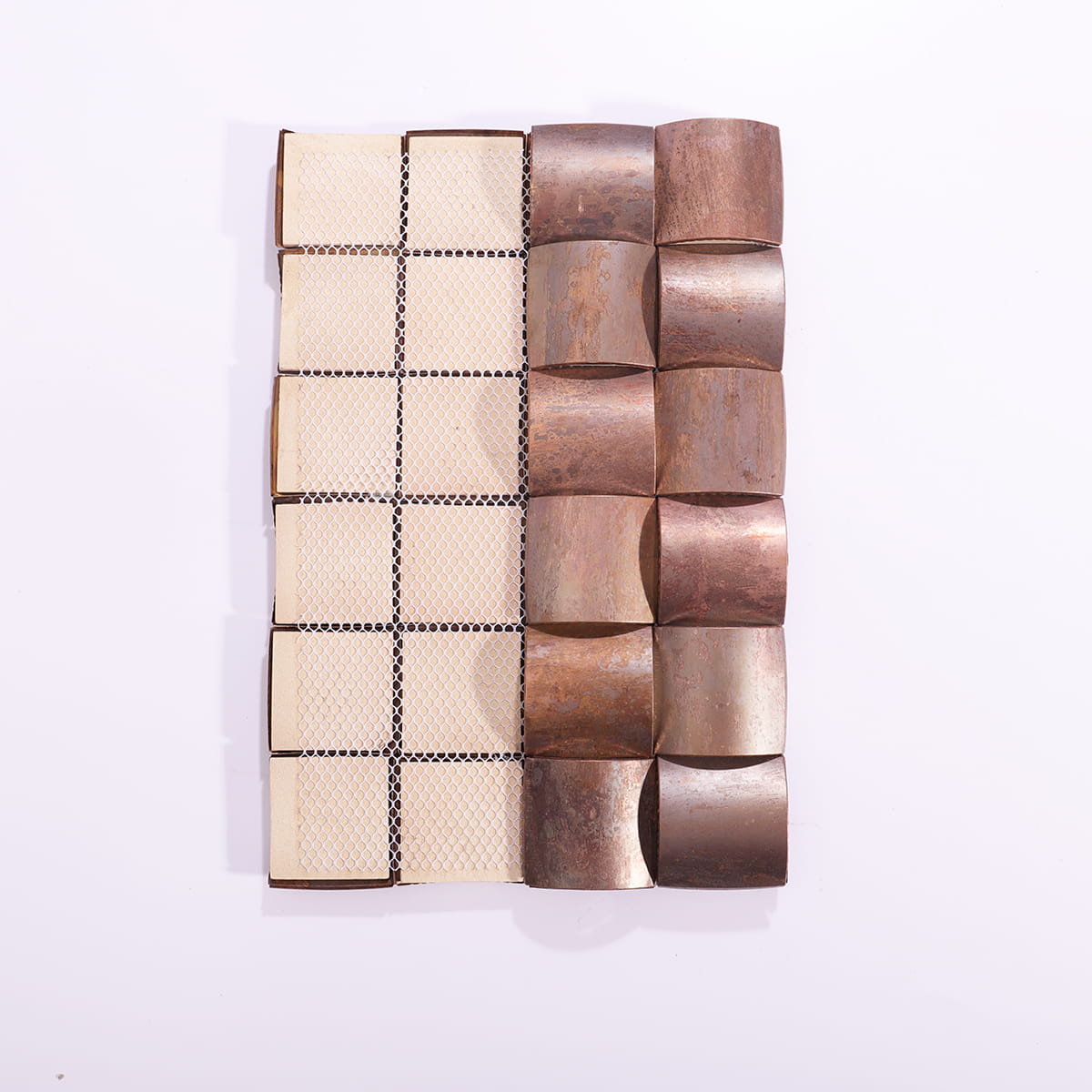 Backside of the copper bread-style mosaic with mesh