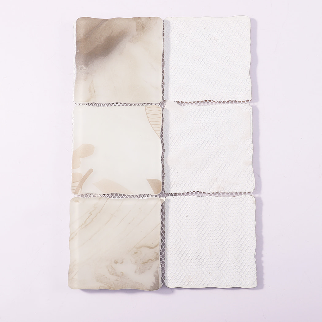 Back view of beige cream wavy square glass mosaic tiles with mesh backing