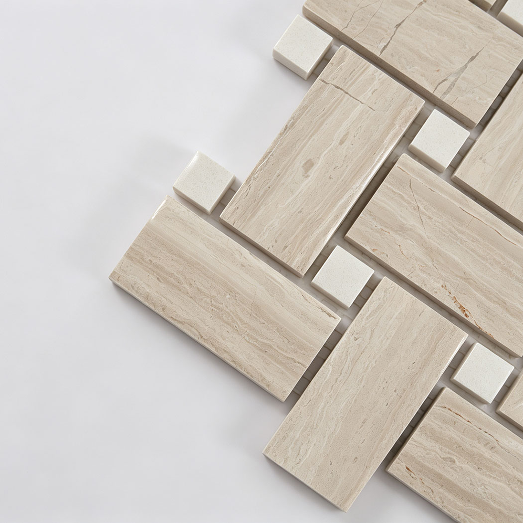 Close-up of beige marble basketweave mosaic tiles with white square inserts