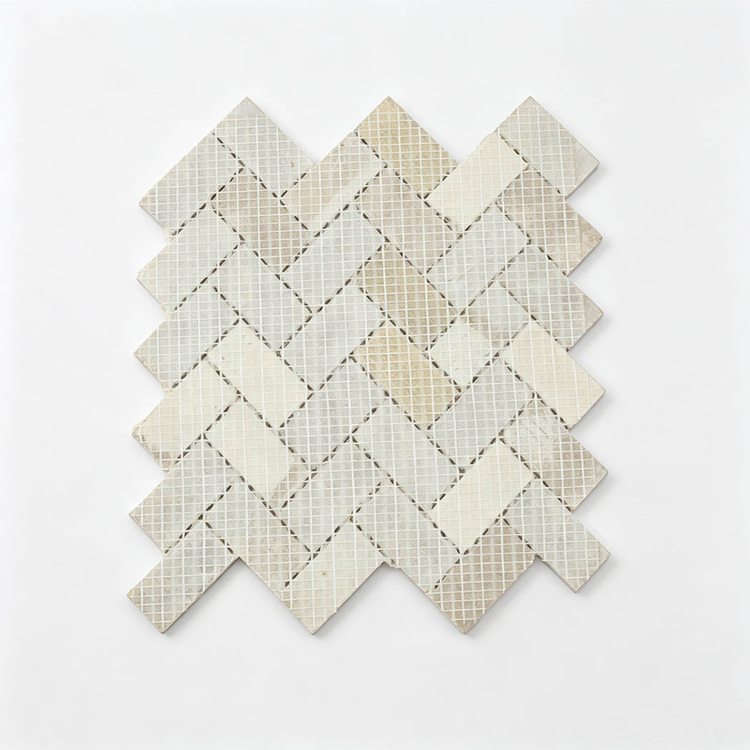 Mesh backing of beige marble herringbone mosaic tile sheet