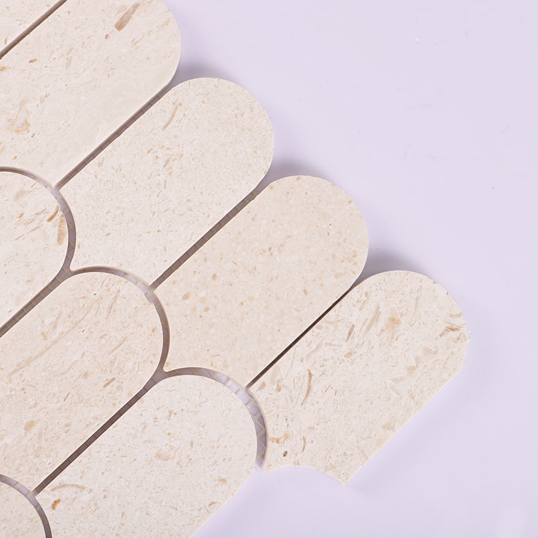 Close up of beige marble mosaic showing stone texture