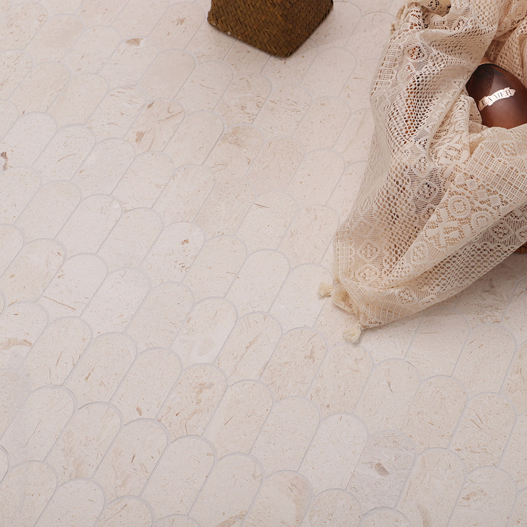 Beige marble mosaic floor with lace fabric and basket decoration