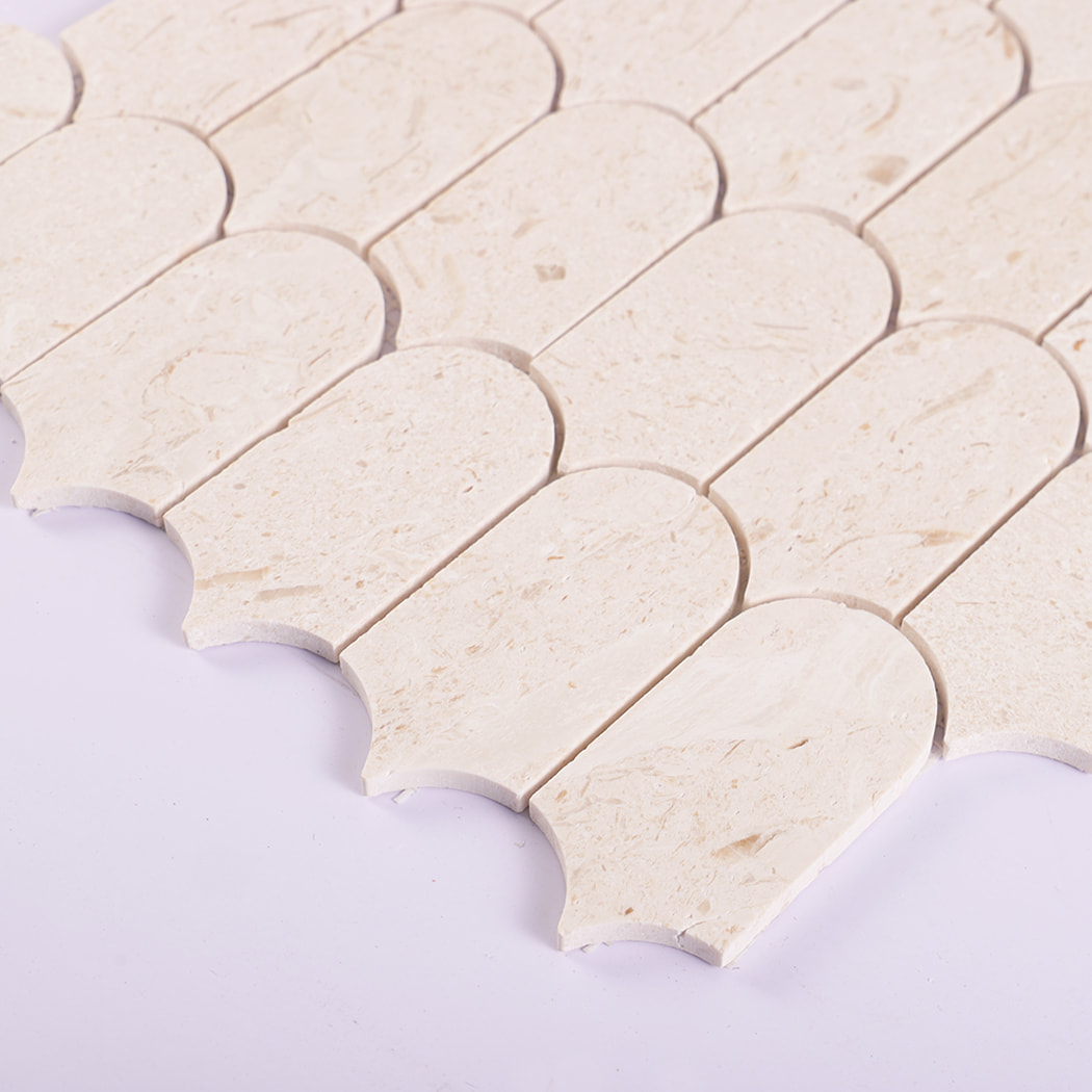 Angled view of beige marble mosaic showing smooth surface