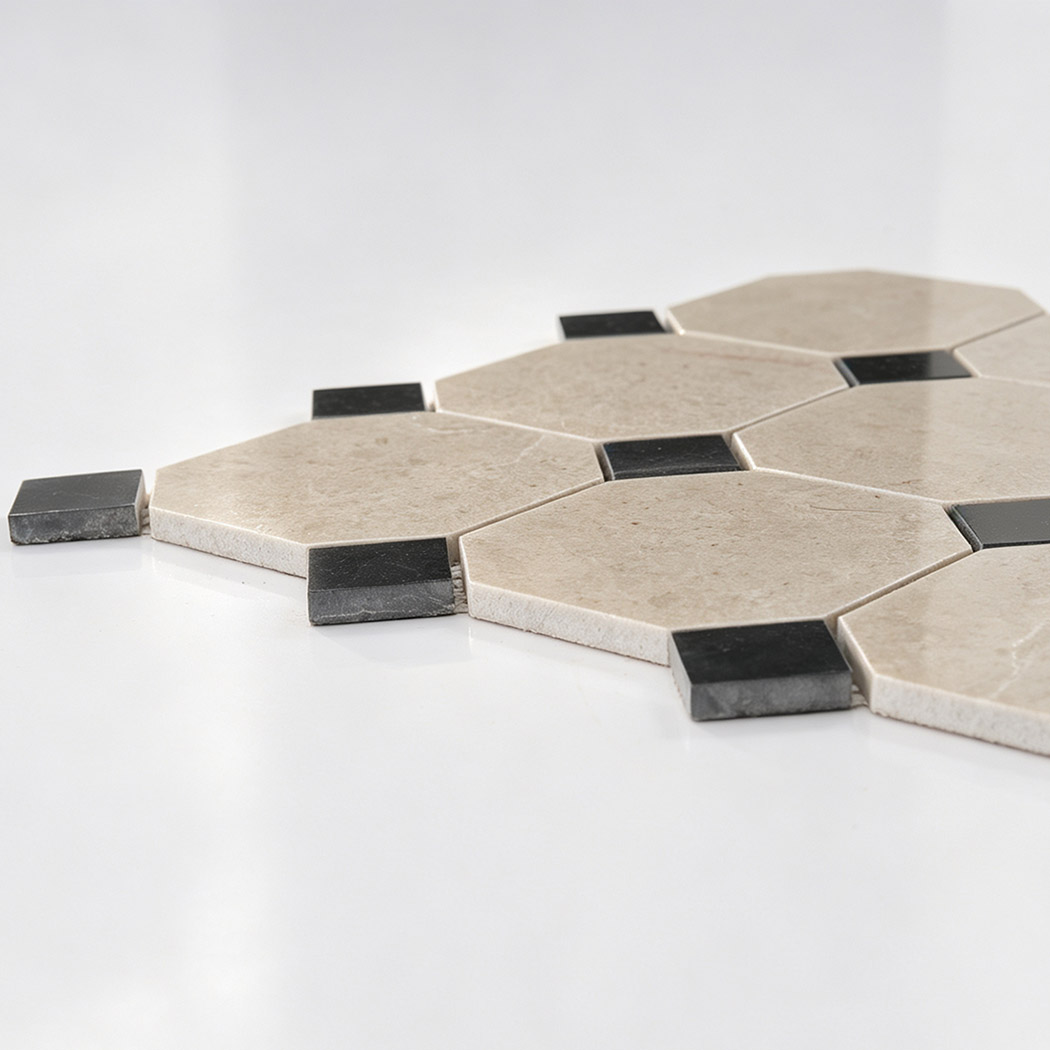 Side view of beige marble octagon mosaic tile with black square accents