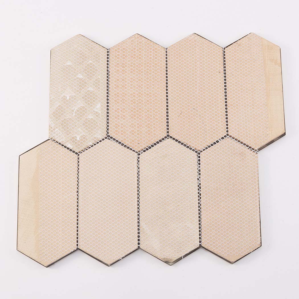 Beige mesh backing hexagon mosaic tile sheet showing rear structure
