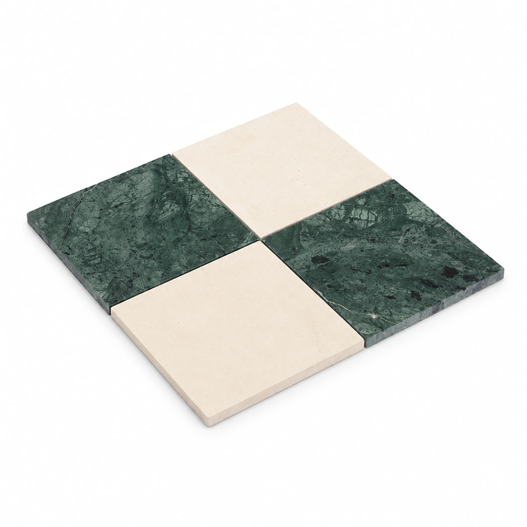 Angled view of beige and dark green marble checkered mosaic tile