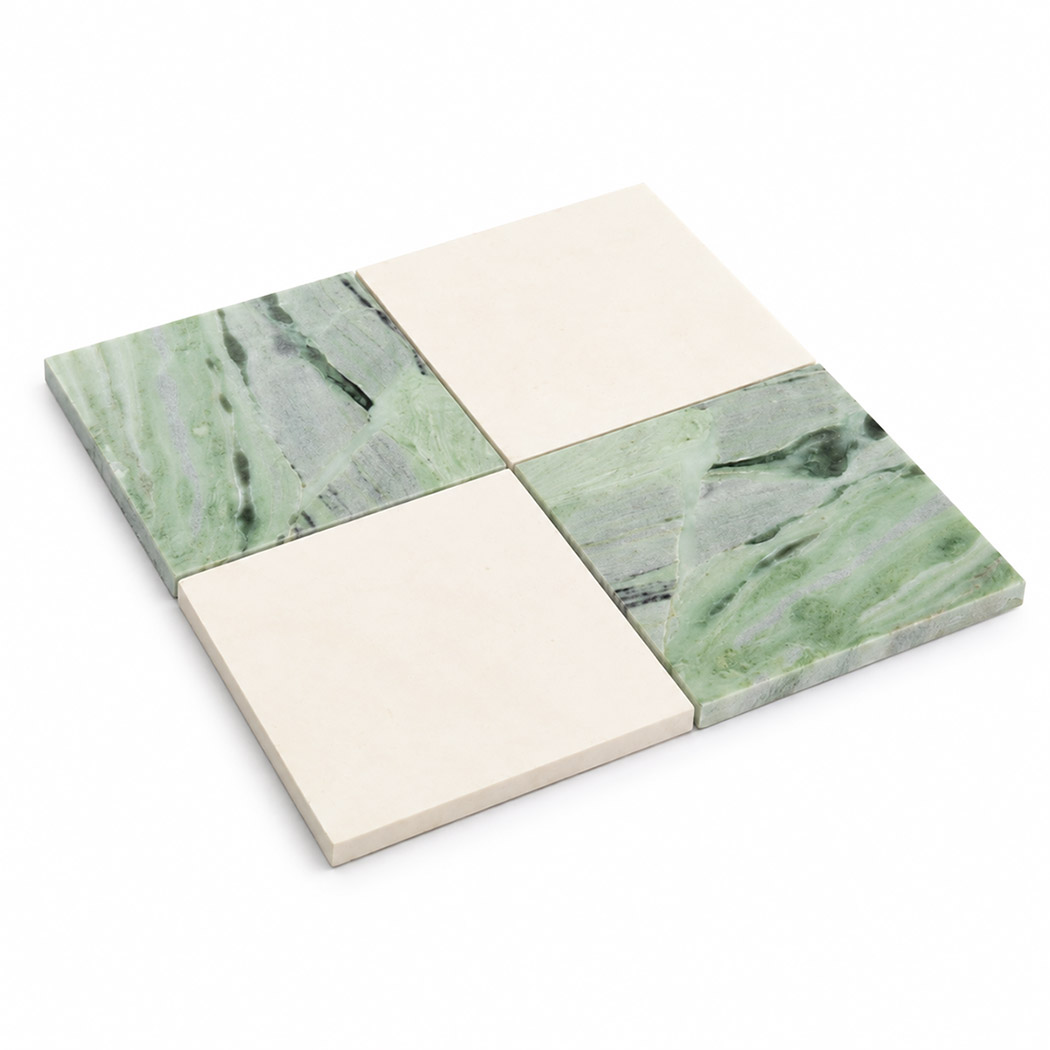 Angled view of beige and light green marble checkered mosaic tile