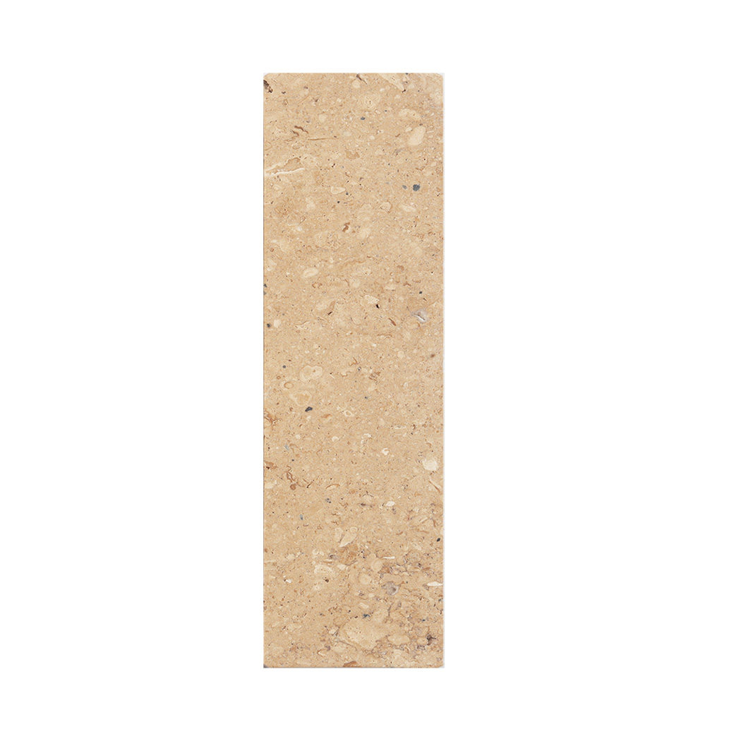 Single beige limestone rectangular tile with soft natural stone speckles