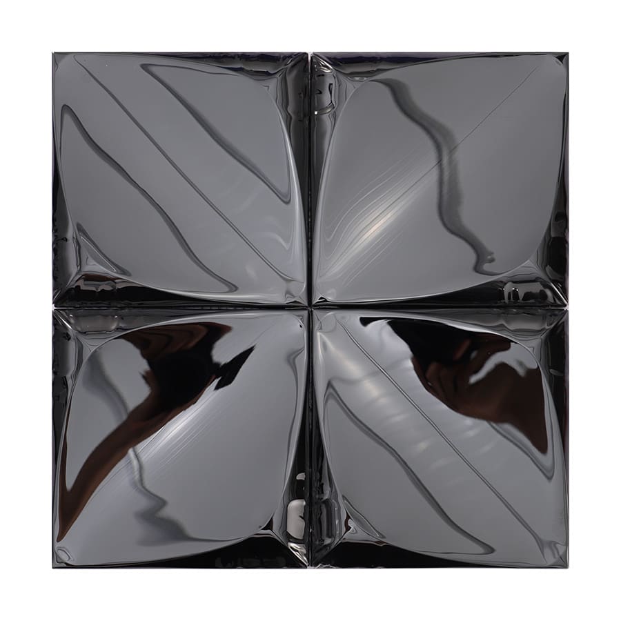 Front view of a black stainless steel mosaic tile composed of four convex petal forms