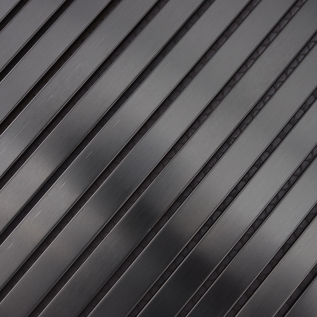 Close-up of black brushed stainless steel ribbon tile strips