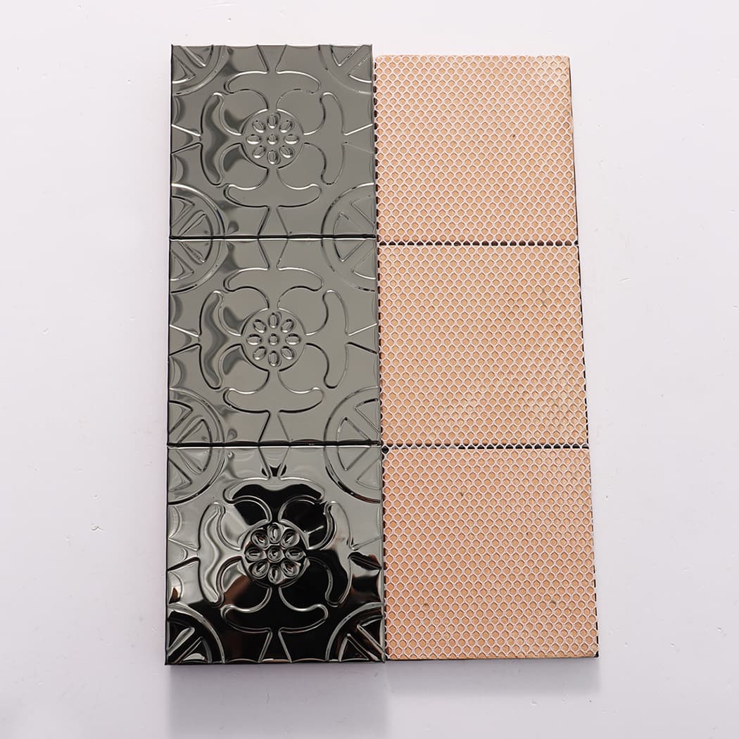 Front tiles and mesh backing shown for a black embossed metal mosaic tile sheet.