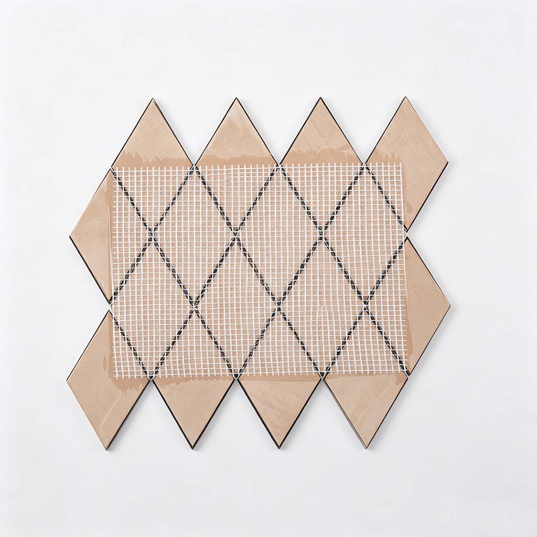 Back view of black and gold diamond metal mosaic tile sheet with mesh backing