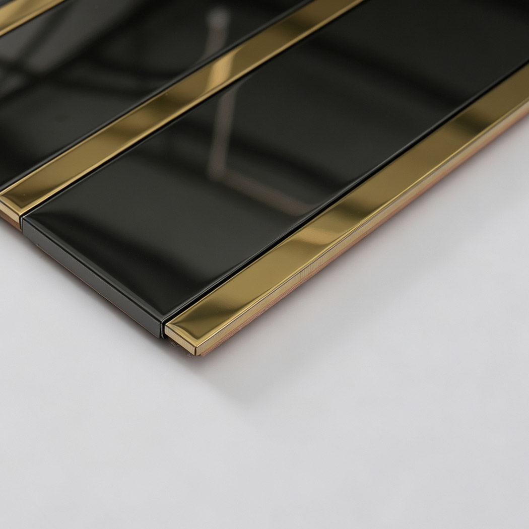 Edge profile of black vertical stacked metal tile with gold trim