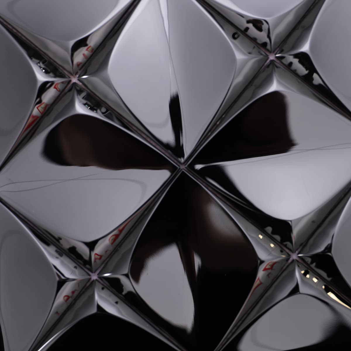 Detailed surface texture of black 3D mirror stainless steel mosaic