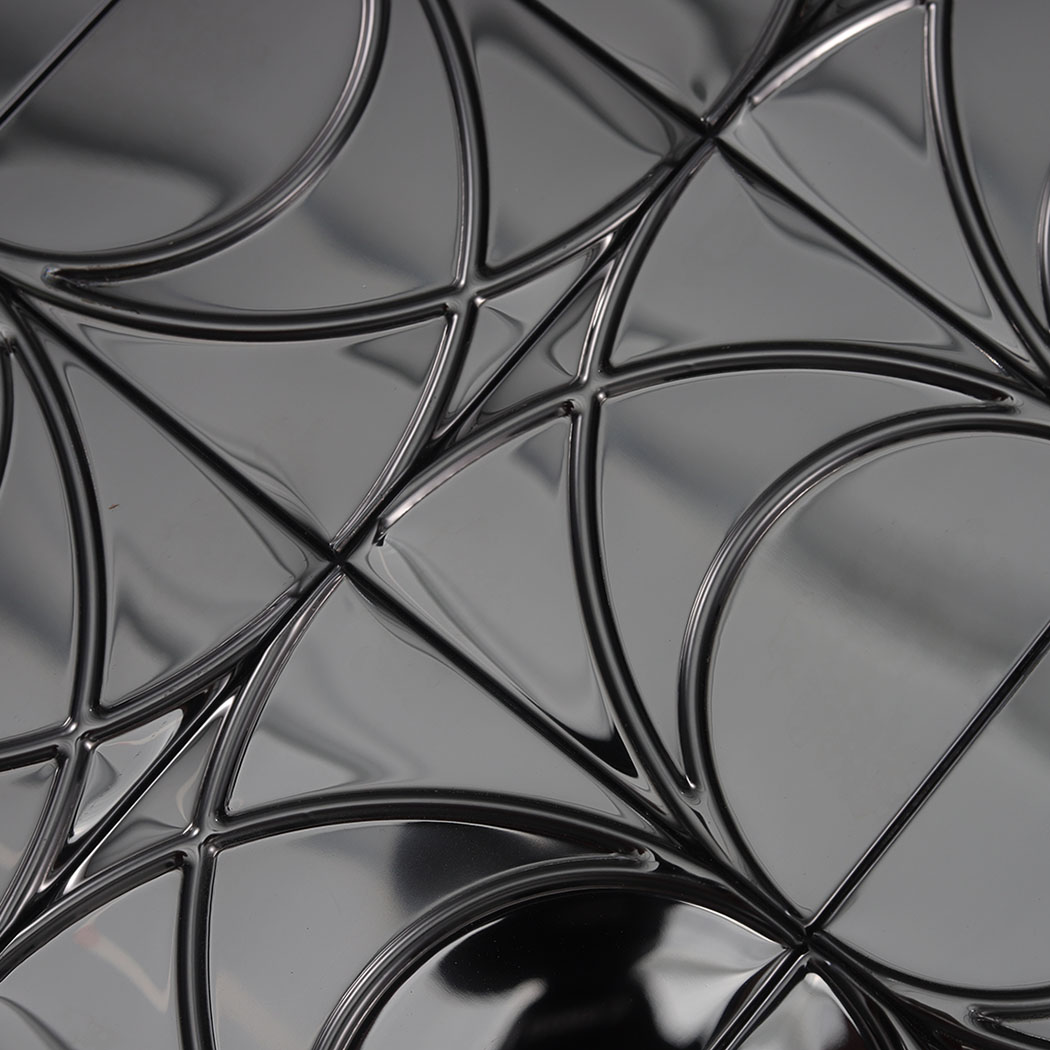 Close-up of black mirror stainless steel circle mosaic pattern