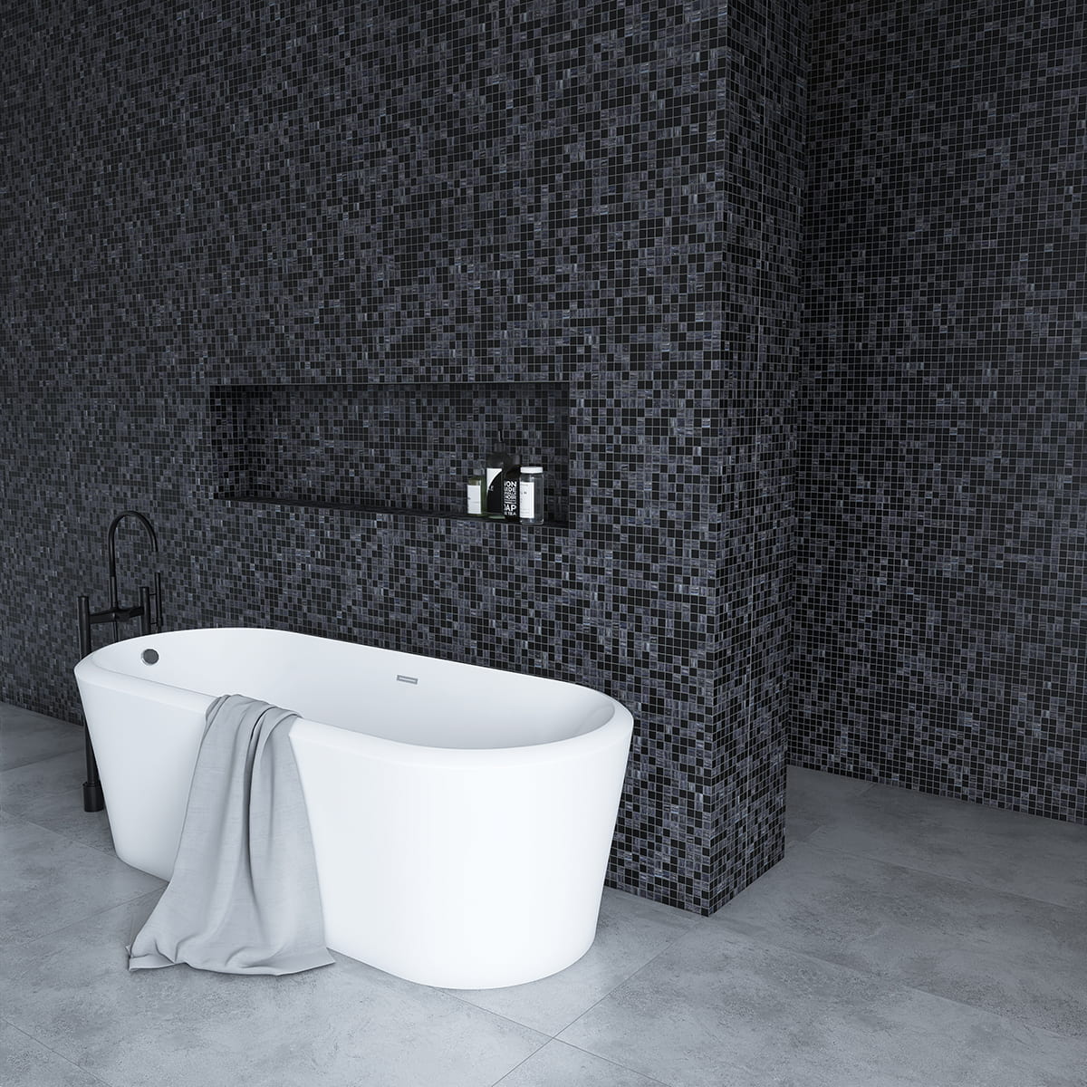 Black and gray mosaic tiles used in a luxurious bathroom setting with a modern tub