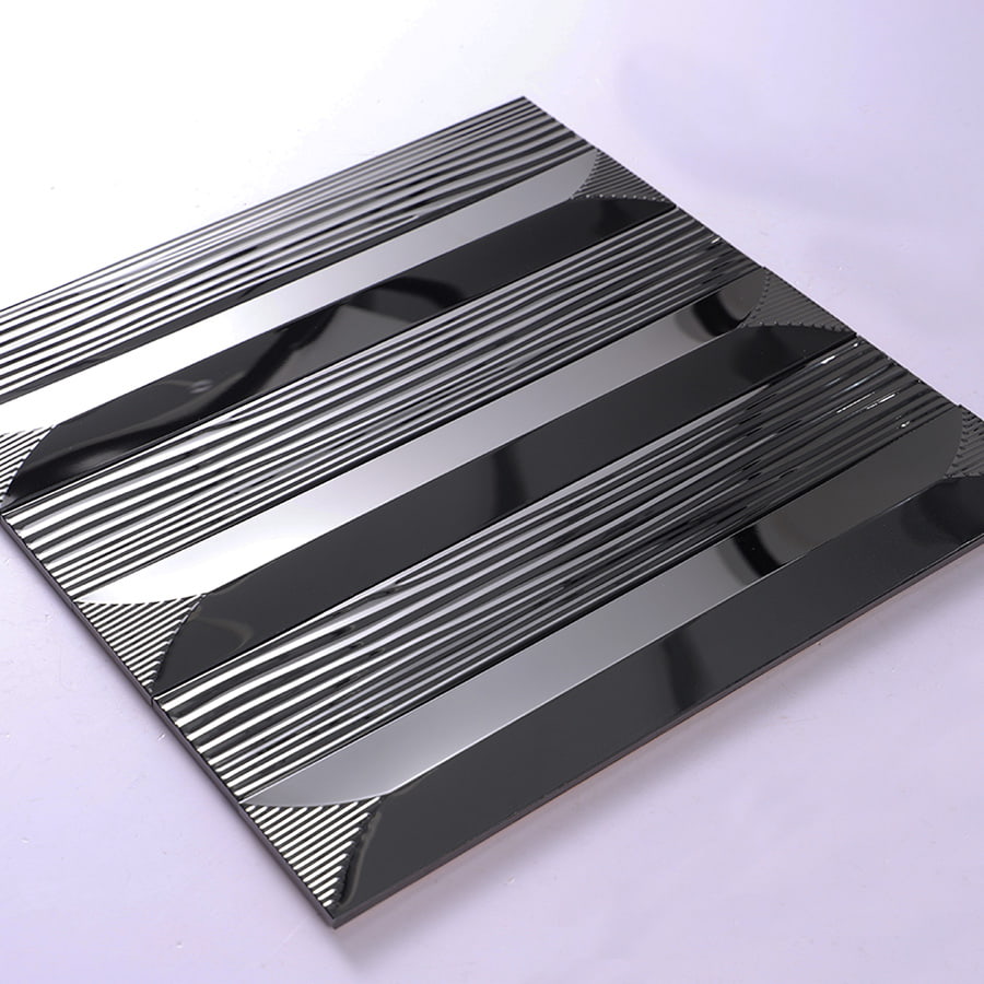Perspective view of black metal mosaic tile with alternating glossy and textured strips.