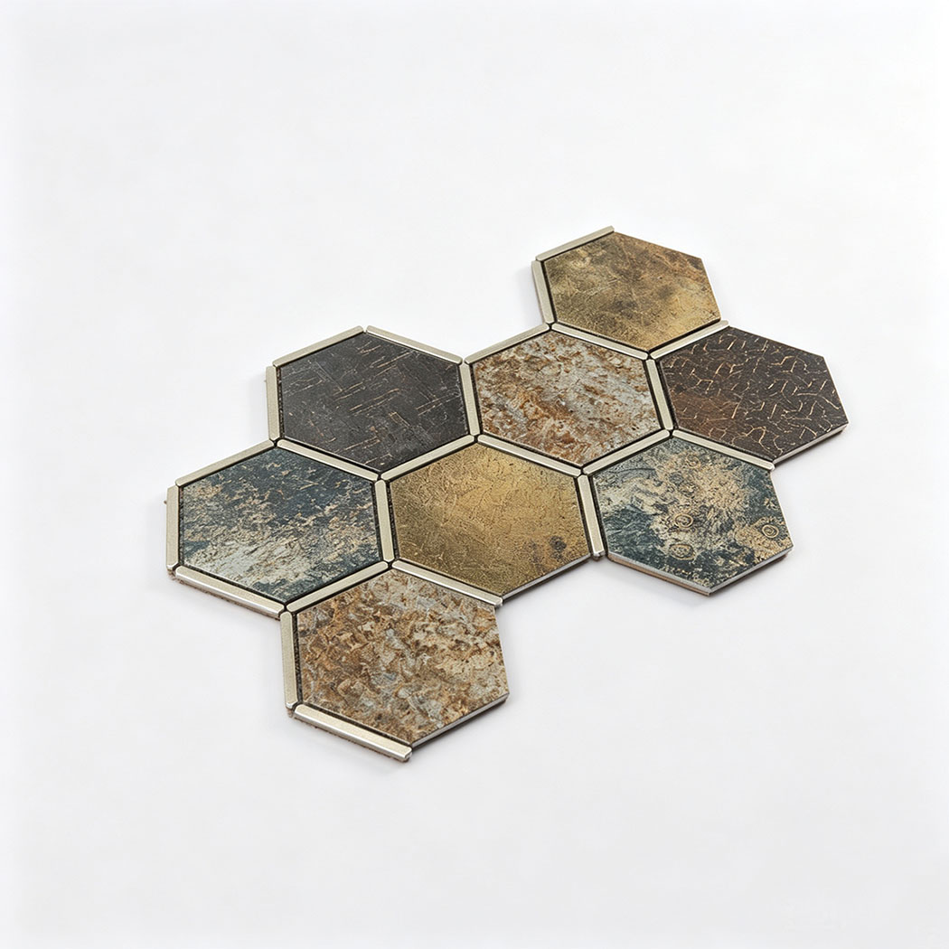 Angled view of blue brown and gold aluminum hexagon mosaic tile sheet