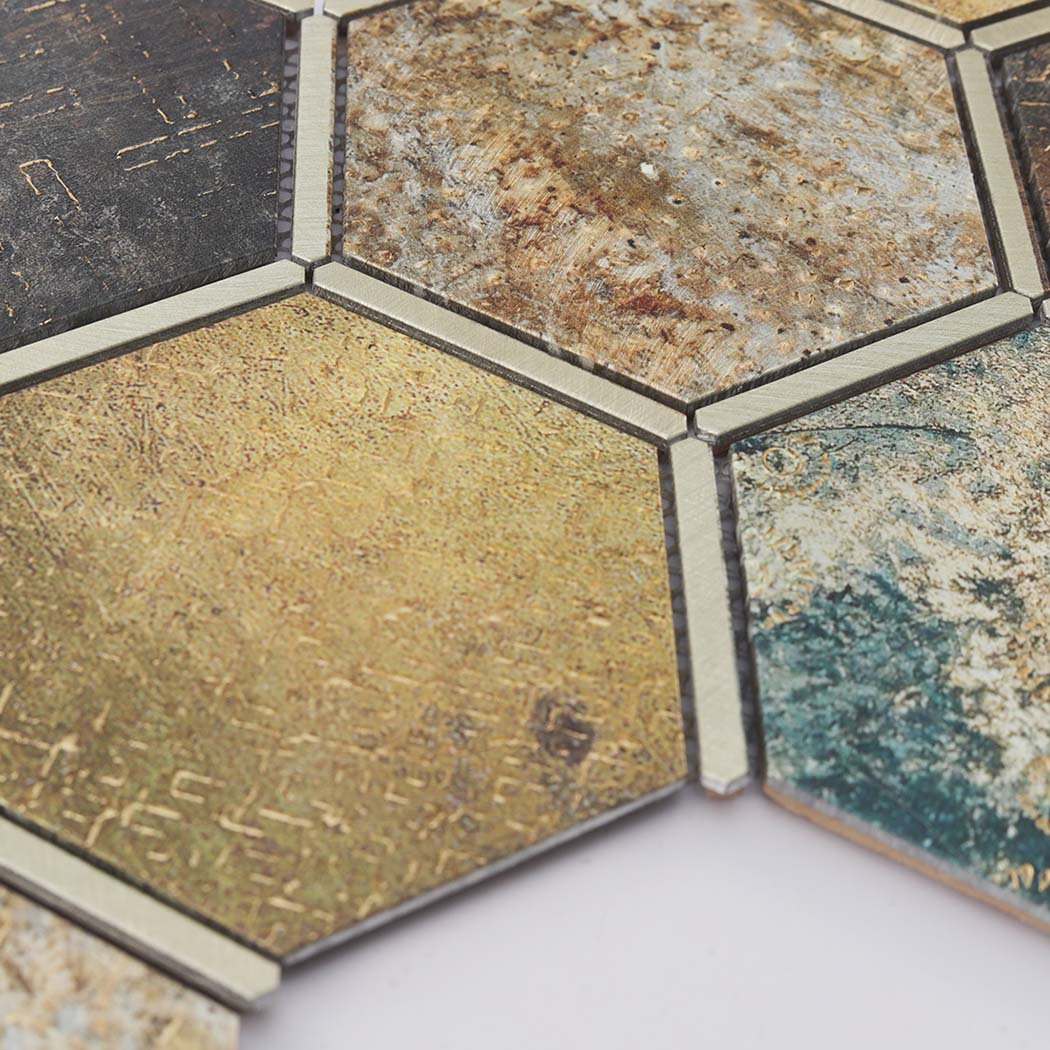 Close-up of blue gold and brown aluminum hexagon mosaic tile surface