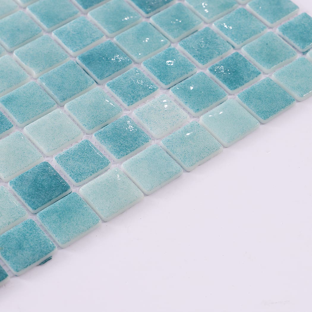 Side area view of blue green recycled glass mosaic tiles with glossy finish.