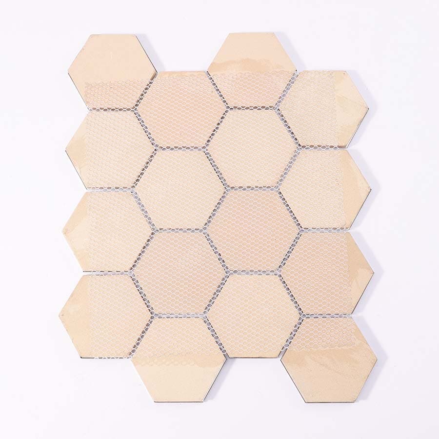 Back view of blue hexagon mosaic tile sheet with mesh backing