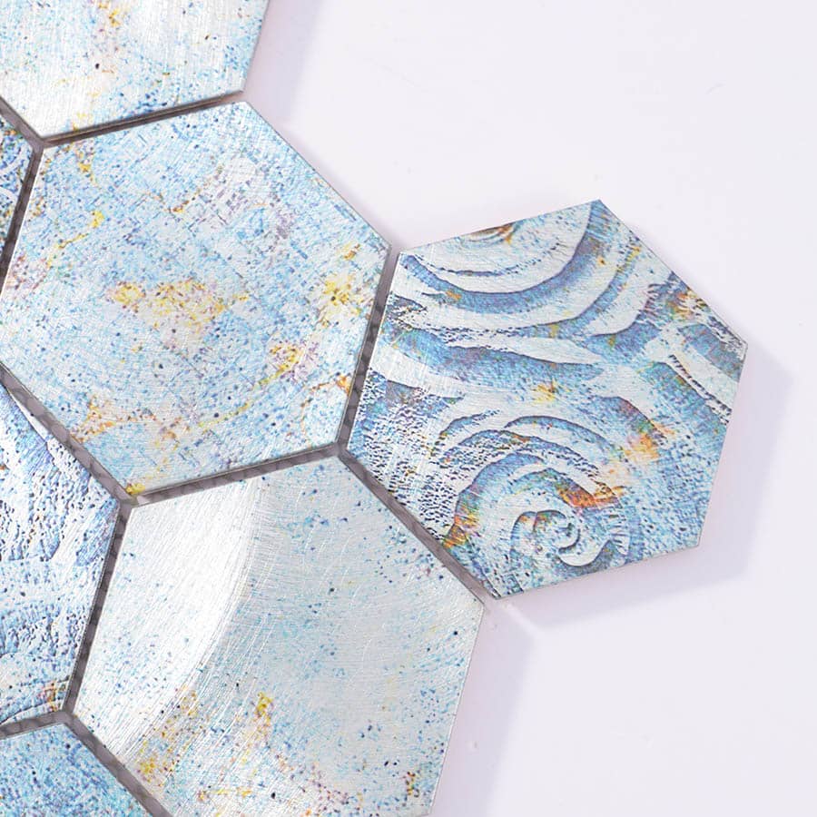 Close-up of textured blue hexagon mosaic tile