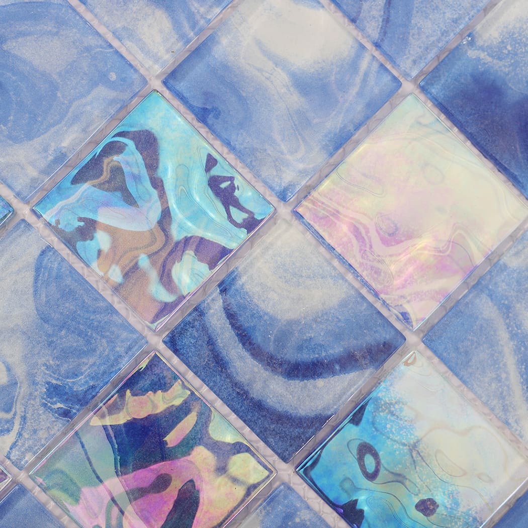 Detailed view of blue marbled and iridescent square glass mosaic tiles