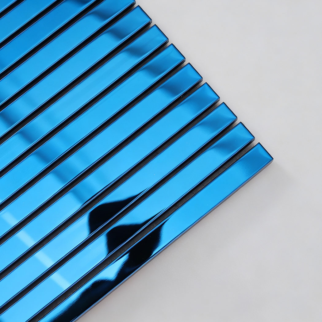 Corner close-up of blue mirror stainless steel linear tile