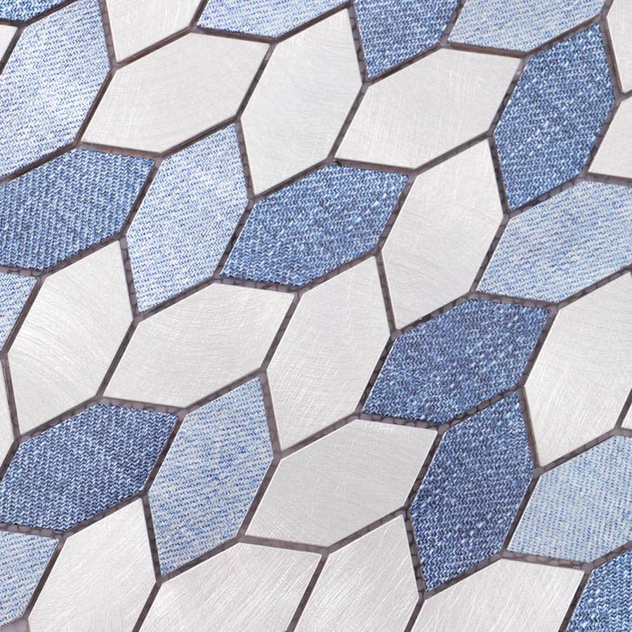 Macro view of daluminum tiles with a mix of smooth metallic and blue woven-style textures.