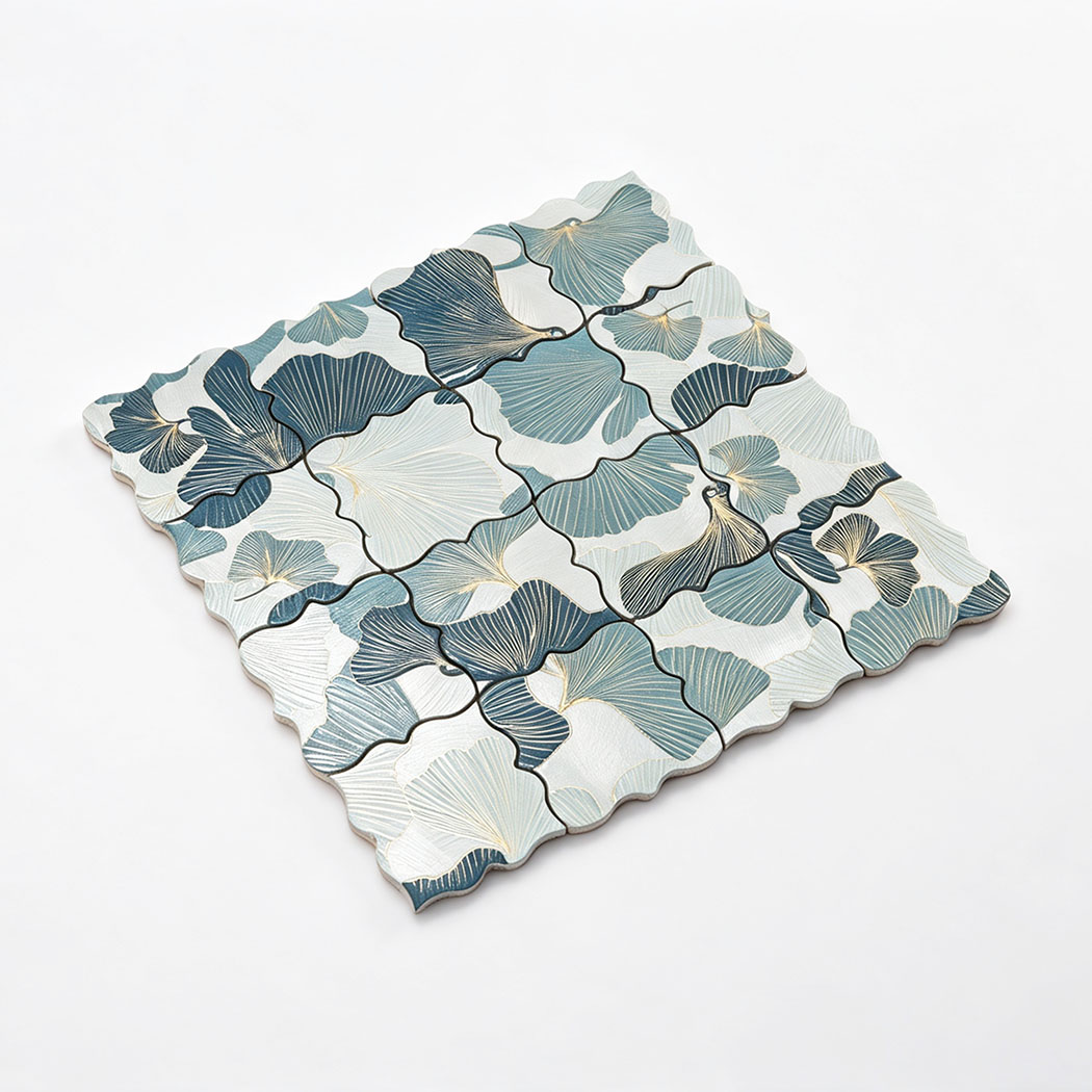Angled view of blue and silver floral aluminum mosaic tile sheet