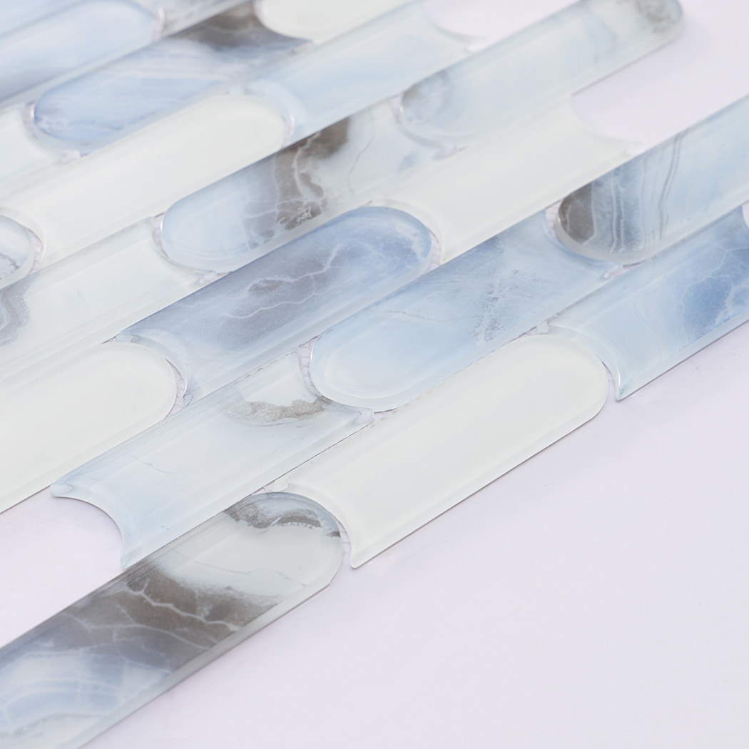 Detailed view of blue white interlocking capsule glass mosaic tile pattern