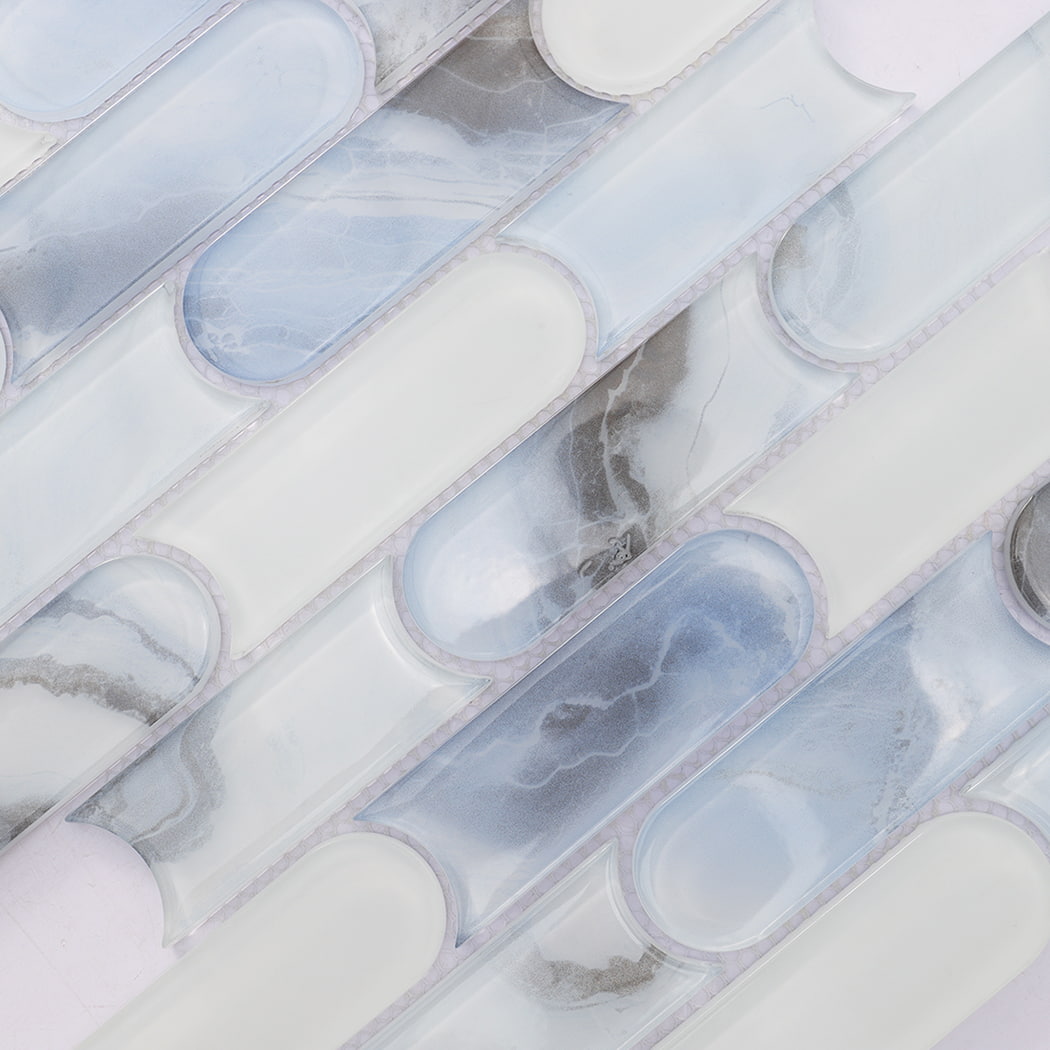 Blue white patterned interlocking capsule glass mosaic tile surface detail
