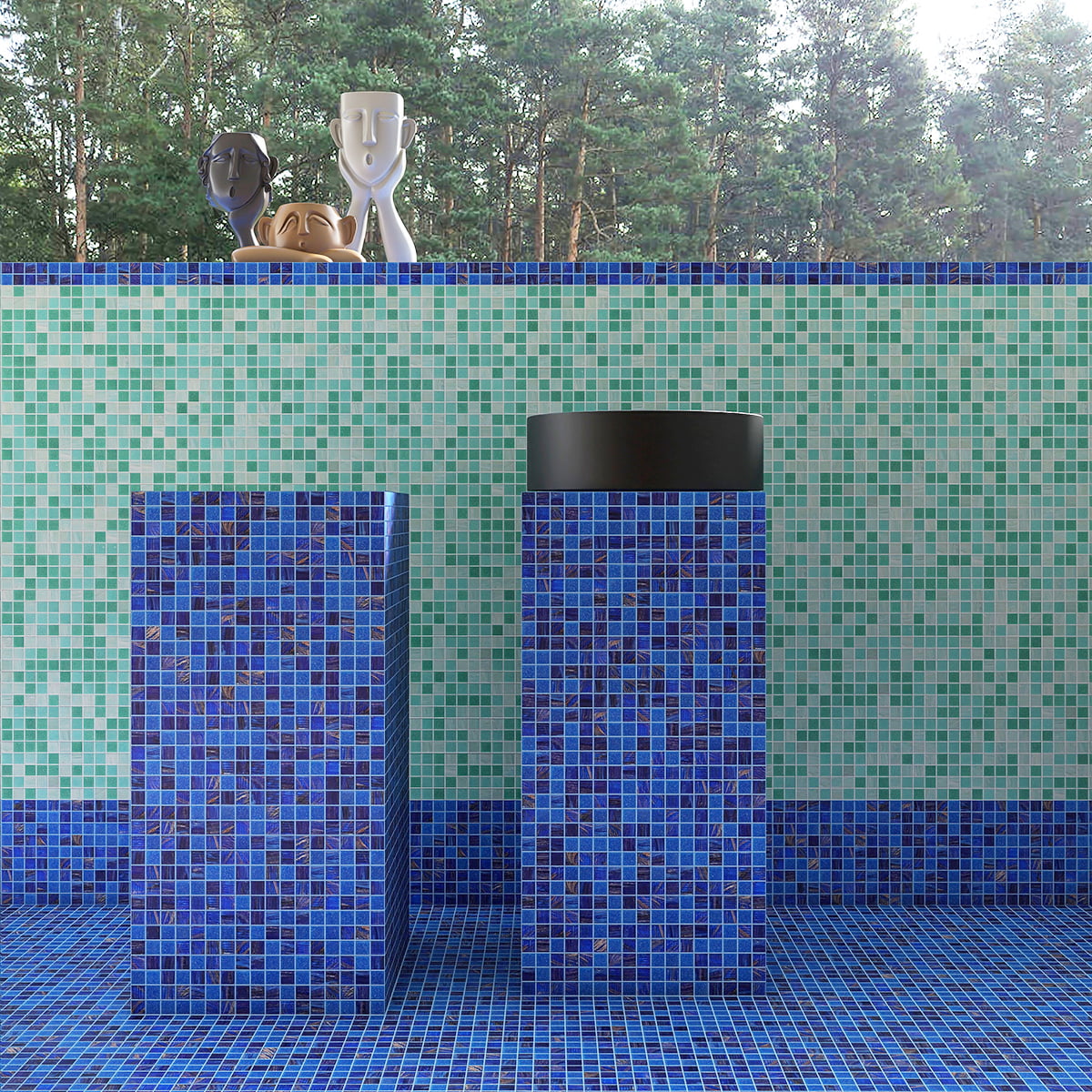 Blue mosaic tiles used on columns and walls for a striking modern design