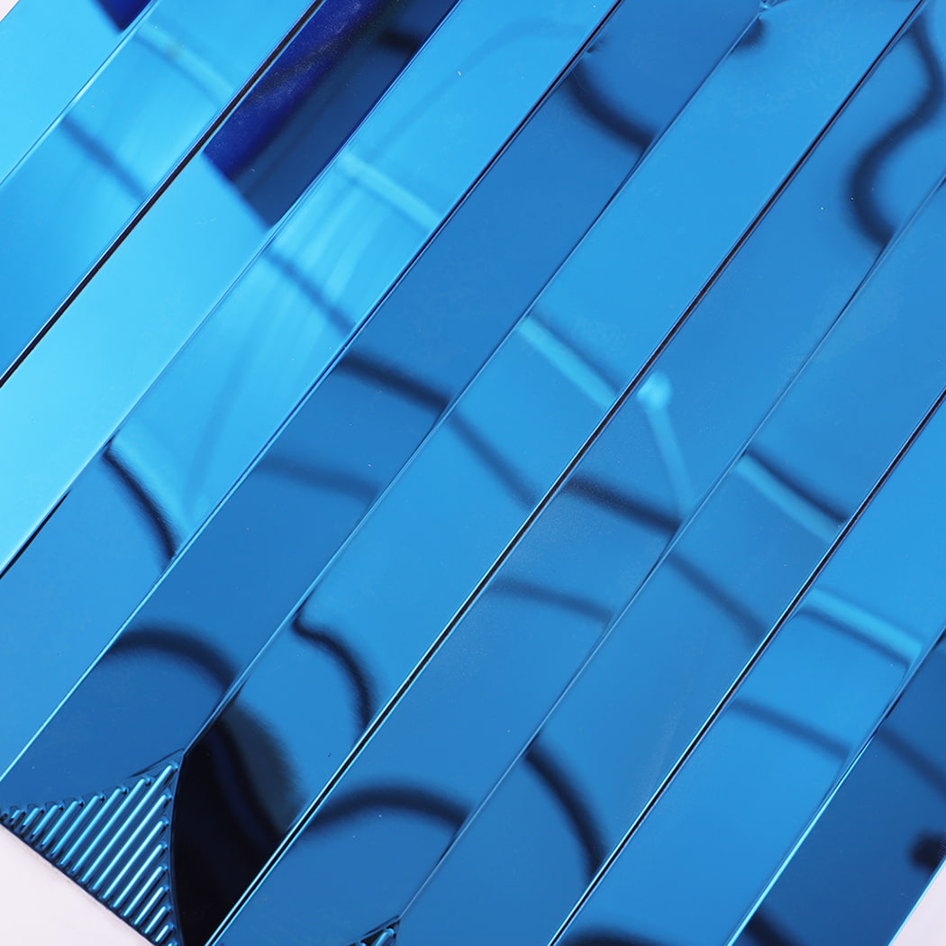 Detailed view of blue stainless steel tile with mirror and ribbed pattern