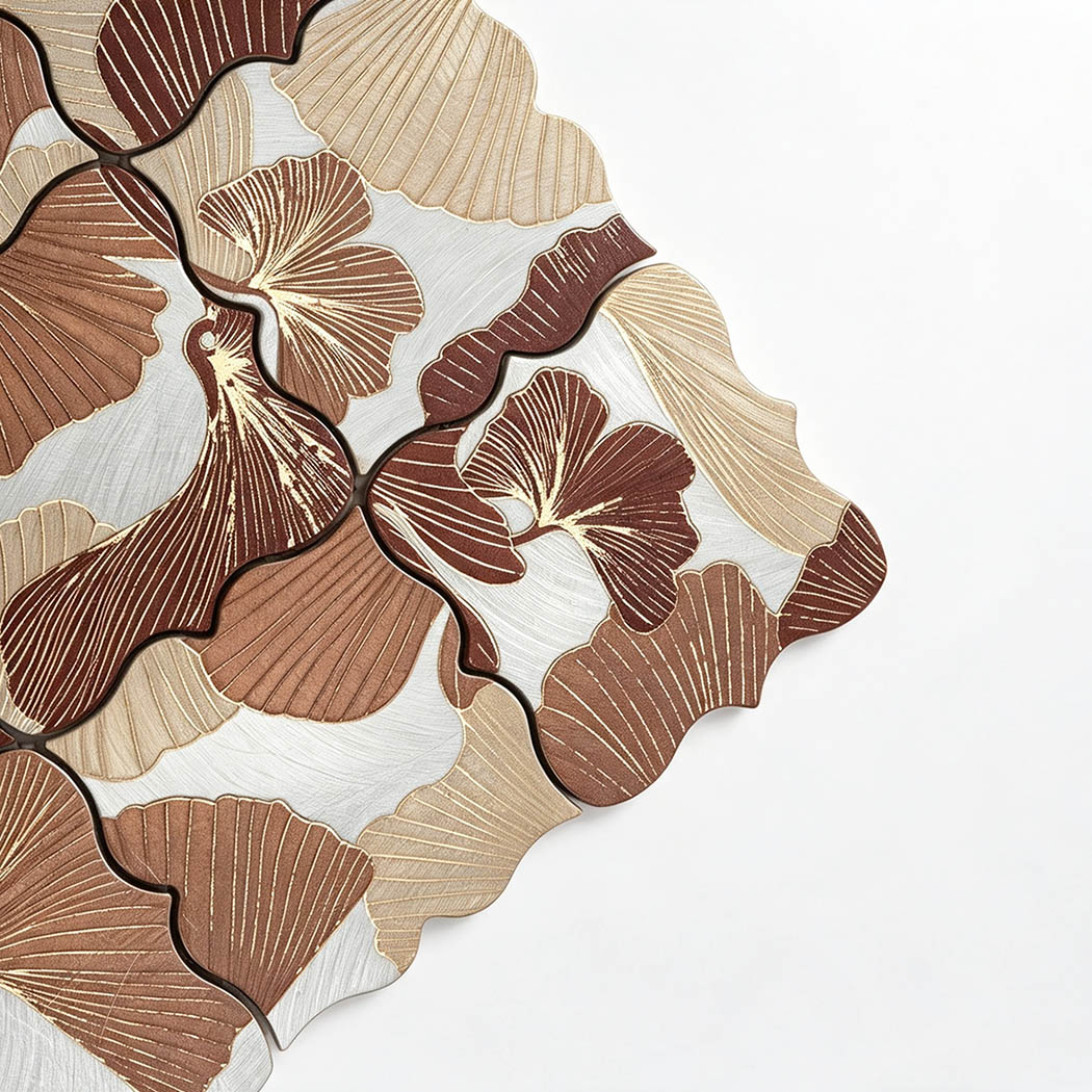 Close-up of brown beige floral aluminum mosaic tile with engraved petal texture