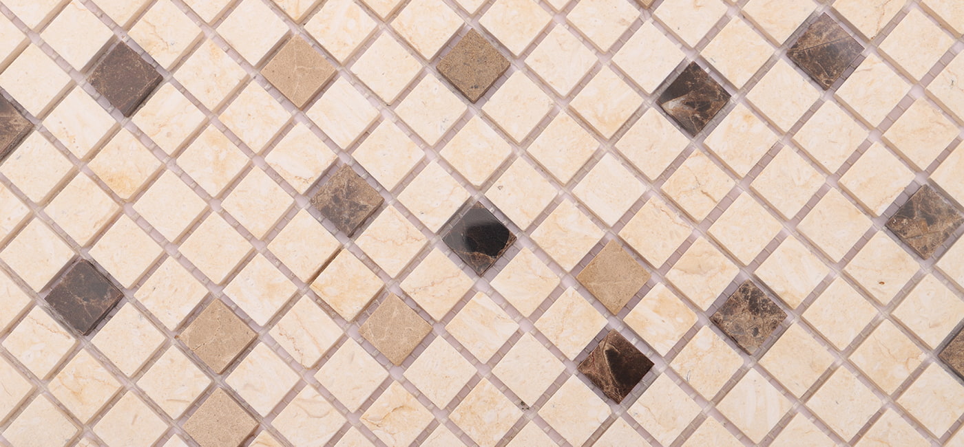 Brown and beige mosaic tiles arranged in a diamond pattern with varying shades of brown and beige.